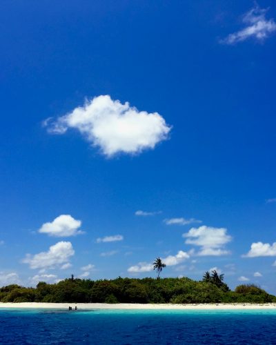 blue sky and white clouds over sea